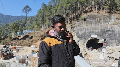 Haridwar Sharma waits for news of his brother Sushil, who is among those trapped inside an under-construction road tunnel that collapsed in Silkyara in the northern Indian state of Uttarakhand, Friday, Nov. 24, 2023. All 41 construction workers who were trapped have been pulled out after 17 days, on Tuesday, Nov. 28. The efforts to reach the workers, aided by international tunneling experts and spearheaded by multiple Indian rescue agencies, was one of the most significant and complicated rescue operations in India’s recent history.