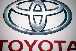 A logo of Toyota Motor Corp. at a dealer Wednesday, May 11, 2022, in Tokyo. Toyota is selling a part of its stake in components maker Denso to raise cash for its drive toward electric vehicles and other innovations, Japan's top automaker said Wednesday, Nov. 29, 2023.
