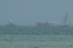 A downed U.S. Navy aircraft is seen in Kaneohe Bay, Monday, Nov. 20, 2023, in Kaneohe, Hawaii.