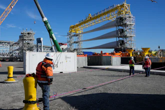 A generator and its blades are prepared at State Pier in New London, Conn., Monday, Dec. 4, 2023, to head to the ocean for the South Fork Wind farm.