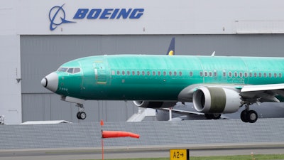 A Boeing 737 MAX 8 airplane being lands following a test flight at Boeing Field in Seattle, April 10, 2019.