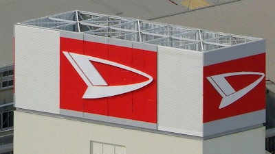 This aerial photo shows the logo of Daihatsu Motor at its headquarters in Ikeda, Osaka, Wednesday, Dec. 20, 2023.