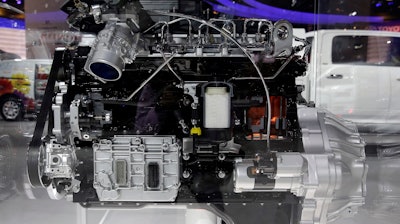 A 6.7L Cummins Diesel engine is displayed at the Ram booth during the media preview of the Chicago Auto Show at McCormick Place in Chicago on Thursday, Feb. 6, 2014.