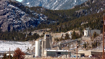 The Stillwater Mining Company, the only platinum and palladium mine in the United States, stands near Nye, Mont., on May 2, 2013. The owner of two precious metals mines in south-central Montana is stopping work on an expansion project and laying off about 100 workers because the price of palladium fell sharply in the past year, mine representatives said Thursday, Nov. 30, 2023. Sibanye-Stillwater announced the layoffs Wednesday at the mine near Nye, Mont., and other Sibanye-owned facilities in Montana, including a recycling operation.