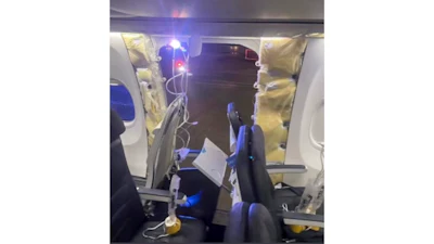 This photo provided by an unnamed source shows the damaged part of an Alaska Airlines Boeing 737 Max 9, Flight 1282, which was forced to return to Portland International Airport on Friday, Jan. 5, 2024.