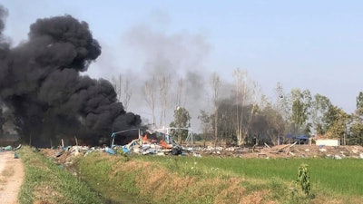 A smoke rises after an explosion at a firework factory in Suphan Buri province, Thailand, Wednesday, Jan. 17, 2024.