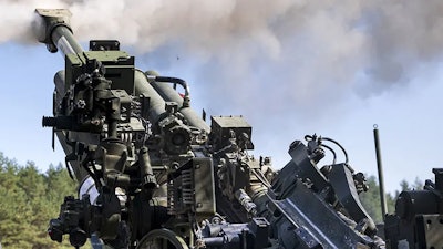 An M777 being fired.