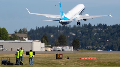 The final version of the 737 MAX, the MAX 10, takes off from Renton Airport in Renton, Wash., on its first flight Friday, June 18, 2021.