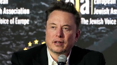 Tesla and SpaceX CEO Elon Musk addresses the European Jewish Association's conference, Jan. 22, 2024, in Krakow, Poland.