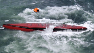 A South Korean tanker is seen capsized off Mutsure Island, Yamaguchi prefecture, southwestern Japan Wednesday, March 20, 2024.