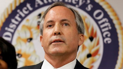 Texas Attorney General Ken Paxton speaks at a news conference in Dallas on June 22, 2017.