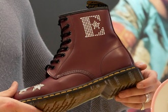 A Dr Martens boot inspired by Elton John's famous Pinball Wizard outfit is shown at a promotional event in London, March 20, 2023.