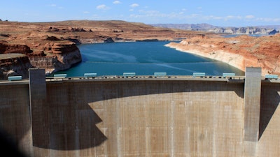 The Glen Canyon Dam is seen, Aug. 21, 2019, in Page, Ariz.