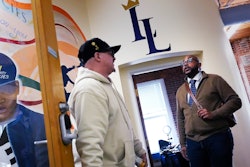 Ron Waddell, founder and executive director of Legendary Legacies, right, talks with Gary Goyette, Worcester, Mass., April 19, 2024.