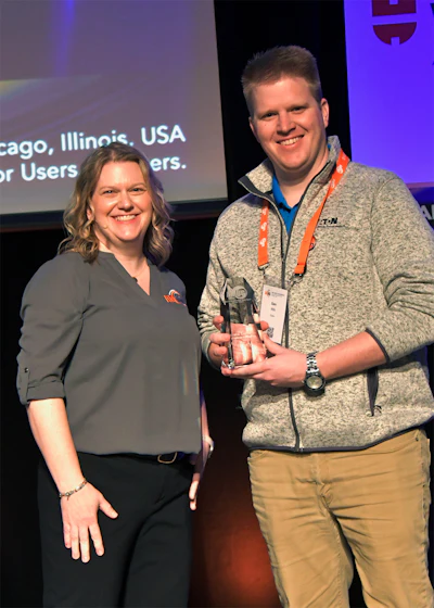 Members’ Choice winner, Sam Mills of Eaton (right), receiving his award from Bonnie Meyer in the 2024 AMUG Technical Competition.