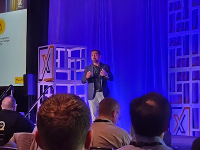 Fluke Reliability President Ankush Malhotra speaks at Xcelerate 2024 in Orlando.