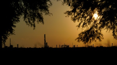 The Denka Performance Elastomer Plant sits at sunset in Reserve, La., on Sept. 23, 2022.