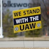 A 'We stand with the UAW' sign appears outside of the Volkswagen plant in Chattanooga, Tenn., on Dec. 18, 2023.