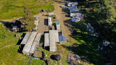 A drone photo of mobile homes at the California Terra Garden, formerly Mountain Mushroom Farm, in Half Moon Bay, Calif., Jan. 26, 2023.
