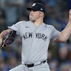 New York Yankees pitcher Carlos Rodon works against the Toronto Blue Jays during the first inning of a baseball game in Toronto on Tuesday, April 16, 2024.