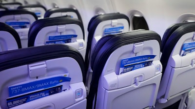 Safety cards in seat backs are seen on an Alaska Airlines Boeing 737 Max 9 aircraft awaiting inspection at the airline's hangar at Seattle-Tacoma International Airport Jan. 10, 2024, in SeaTac, Wash.