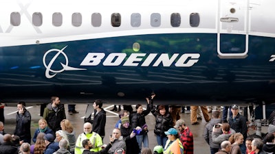 A Boeing 737 MAX 7 is displayed during a debut for employees and media on Feb. 5, 2018, in Renton, Wash.