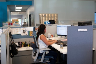 Social worker Lupita Armijo-Garcia works at her desk in the Ottawa County, Mich., Department of Public Health office, Sept. 5, 2023, in Holland, Mich. On Friday, May 3, 2024, the U.S. government issues its April jobs report.