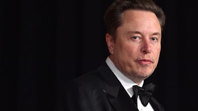 Elon Musk arrives at the 10th Breakthrough Prize Ceremony at the Academy Museum of Motion Pictures in Los Angeles, April 13, 2024.