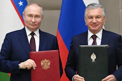 Russian President Vladimir Putin, left, and Uzbek President Shavkat Mirziyoyev attend a signing ceremony following a meeting in expanded format at the Kuksaroy Presidential Palace in Tashkent, Uzbekistan, Monday, May 27, 2024.