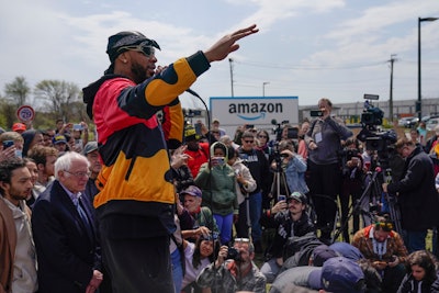 Chris Smalls, president of the Amazon Labor Union, speaks at a rally outside an Amazon warehouse on Staten Island in New York, April 24, 2022.