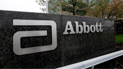 A sign at an Abbott Laboratories campus facility is displayed, April 28, 2016, in Lake Forest, Ill.