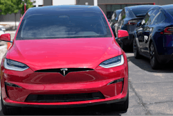 Unsold 2023 Model X sports-utility vehicles sit at a Tesla dealership, June 18, 2023, in Littleton, Colo.