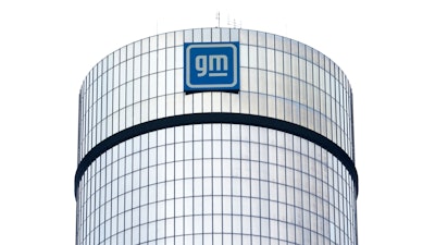 A General Motors logo is seen on a building, April 24, 2024, in Detroit.