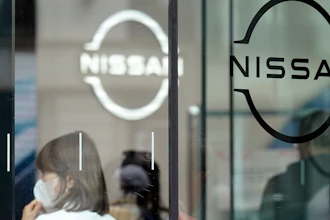 Logos at a Nissan showroom are seen in Ginza shopping district in Tokyo.