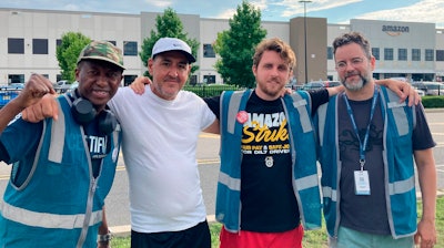 From left, union organizers Brima Sylla, Pasquale Cioffi, Connor Spence and Aaron Novik outside an Amazon warehouse on Staten Island, June 18, 2024.