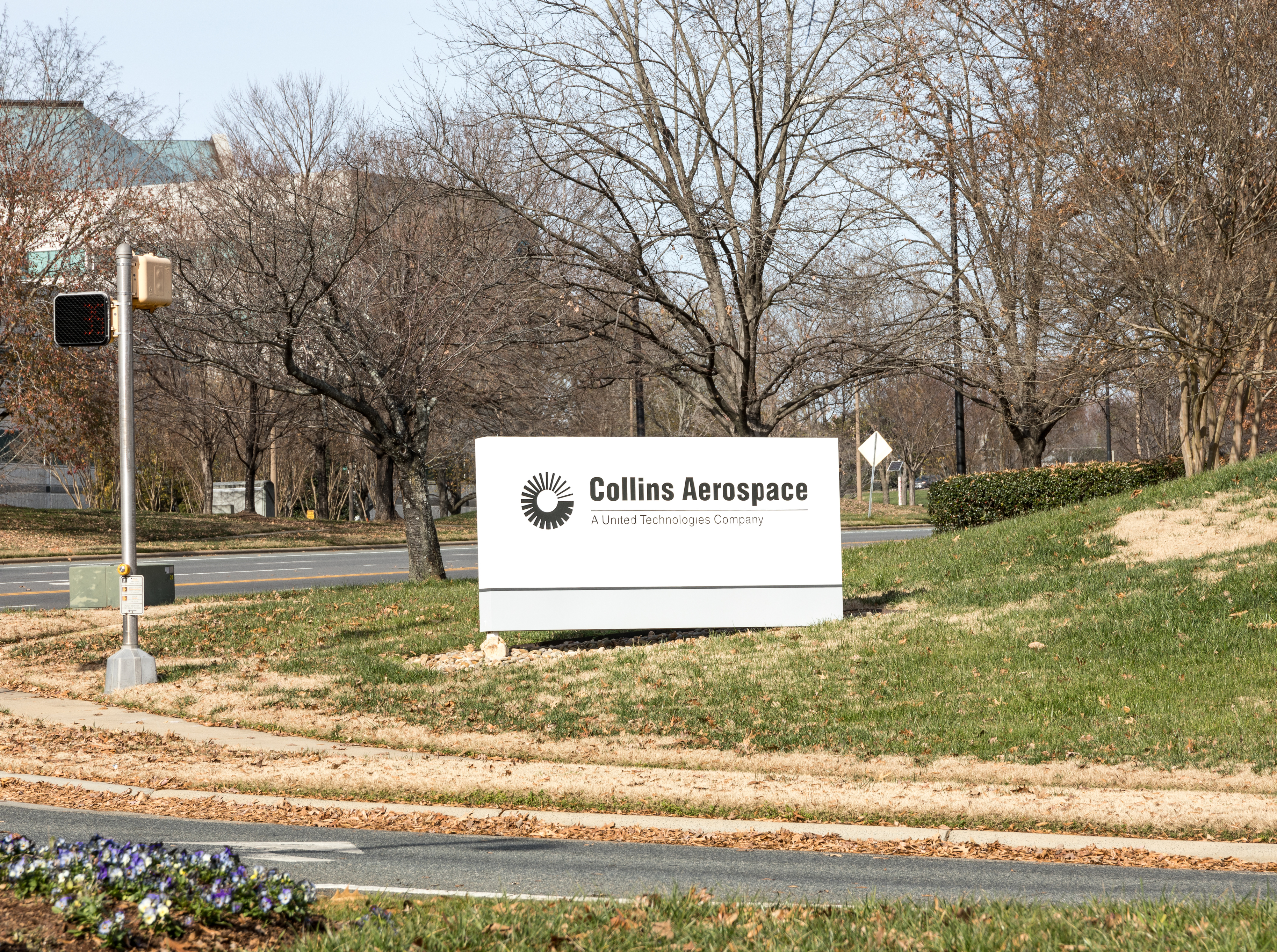 A street sign for Collins Aerospace.