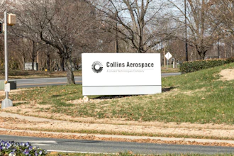 A street sign for Collins Aerospace.