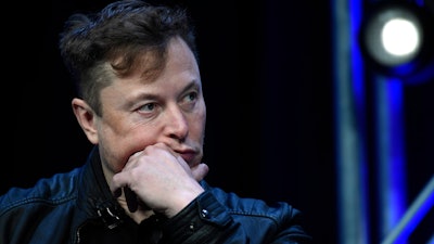 Tesla and SpaceX chief executive officer Elon Musk listens to a question as he speaks at the SATELLITE Conference and Exhibition in Washington, March 9, 2020.