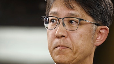 Toyota's President and CEO Koji Sato attends a news conference after receiving a corrective order from the transport ministry in Tokyo, Wednesday, July 31, 2024.