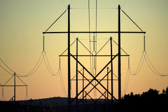 Central Maine Power transmission lines are seen on Oct. 6, 2021, in Pownal, Maine.