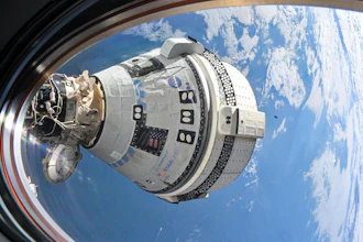 This photo provided by NASA shows Boeing's Starliner spacecraft which launched astronauts Butch Wilmore and Suni Williams to the International Space Station docked to the Harmony module's forward port on July 3, 2024, seen from a window on the SpaceX Dragon Endeavour spacecraft docked to the adjacent port.