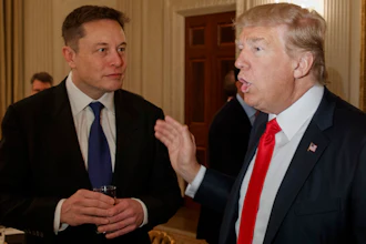 President Donald Trump, right, talks with Tesla and SpaceX CEO Elon Musk at the White House in Washington, Feb. 3, 2017.
