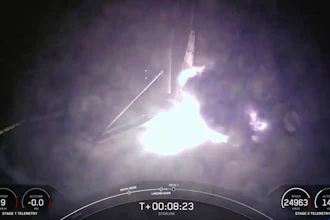 This image created from a SpaceX video, shows the moment when the SpaceX Falcon 9 rocket's first-stage fell over in flames after landing on an ocean platform offshore, Wednesday, Aug. 28, 2024, in the Atlantic Ocean.