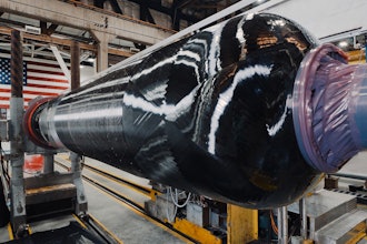 Northrop Grumman performs the insulation layup and composite case wind of its 2024 SMART Demo solid rocket motor case.