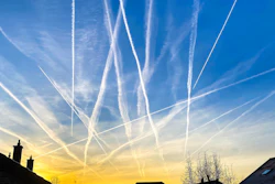 Plane contrails in the sky.