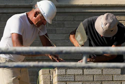 Construction workers at a residential building site in Chicago, Aug. 29, 2024.