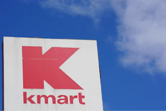A large Kmart sign is displayed in front of a shopping plaza in Avenel, N.J., April 4, 2022.