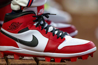 Atlanta Braves outfielder Jorge Soler wears custom Nike Air Jordan cleats in the dugout during the seventh inning of a baseball game against the Colorado Rockies, Sept. 5, 2024, in Atlanta.