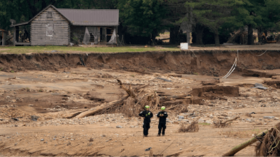 Personnel from Urban Search and Rescue Utah Task Force 1 continue to search for victims of the Impact Plastics tragedy in the aftermath of Hurricane Helene Friday, Oct. 4, 2024, in Erwin, Tenn.