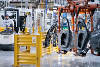 A worker operates a machine at the BMW Spartanburg plant in Greer, S.C., Oct. 19, 2022.